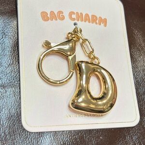 Anthropologie Gold Bag Charm